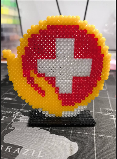 Arte de mesa de emblema de jogo em Hama Beads com base preta